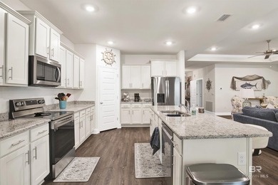 Welcome to this spacious 4-bedroom, 3-bath home in the desirable - photo 8