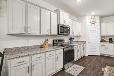Welcome to this spacious 4-bedroom, 3-bath home in the desirable - photo 9