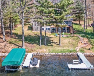 Stunning home on the level shore of Lake Minocqua w/ Southern - Lake Home For Sale in Minocqua, Wisconsin