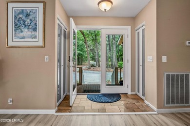 Tucked away on over an acre of wooded privacy with marsh views - photo 5