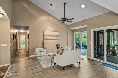 Tucked away on over an acre of wooded privacy with marsh views - photo 6