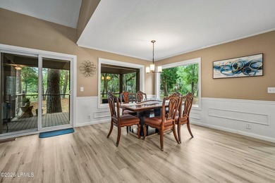 Tucked away on over an acre of wooded privacy with marsh views - photo 8