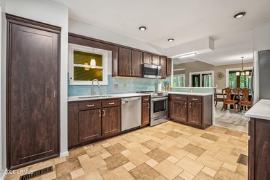Tucked away on over an acre of wooded privacy with marsh views - photo 10