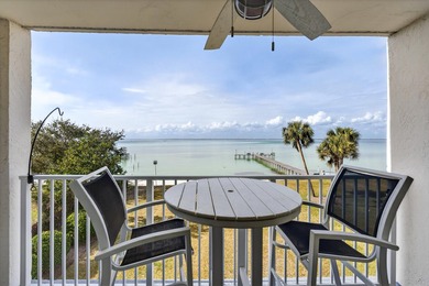 Rare opportunity to own a 3rd-floor end unit in the gated - photo 1