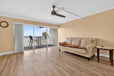 Rare opportunity to own a 3rd-floor end unit in the gated - photo 3