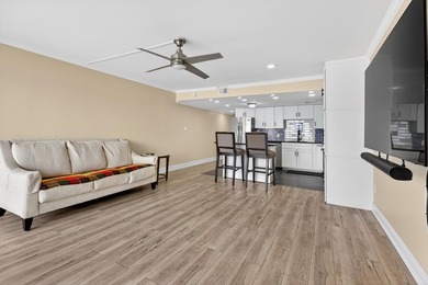 Rare opportunity to own a 3rd-floor end unit in the gated - photo 9