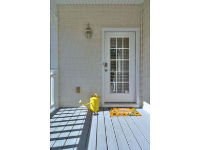 This charming lakefront cottage has new HVAC units and was built - photo 11