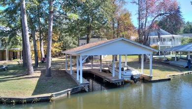 This charming lakefront cottage has new HVAC units and was built - photo 21