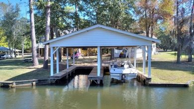 This charming lakefront cottage has new HVAC units and was built - photo 22