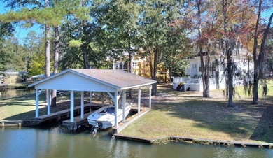 This charming lakefront cottage has new HVAC units and was built - photo 23