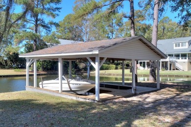 This charming lakefront cottage has new HVAC units and was built - photo 24