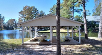 This charming lakefront cottage has new HVAC units and was built - photo 25