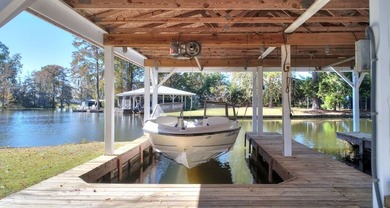 This charming lakefront cottage has new HVAC units and was built - photo 27