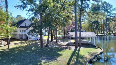This charming lakefront cottage has new HVAC units and was built - photo 28