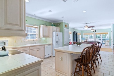 This charming lakefront cottage has new HVAC units and was built - photo 33