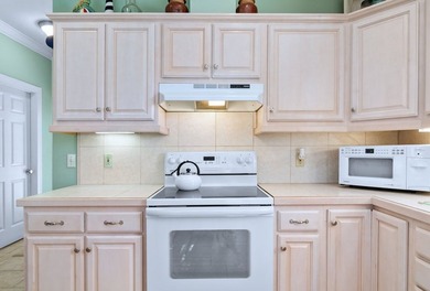 This charming lakefront cottage has new HVAC units and was built - photo 37