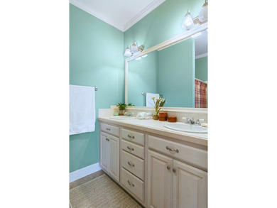 This charming lakefront cottage has new HVAC units and was built - photo 58