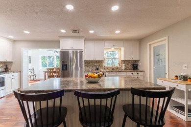 Nestled on 1.33 acres of picturesque lakefront property, this - photo 22
