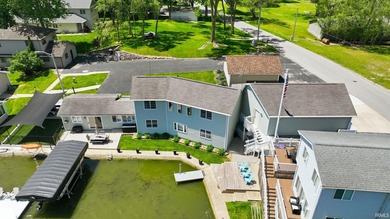 Arrive at this beautifully updated lake home and immediately - photo 36