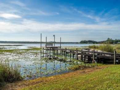 Situated on 2.19 acres with 200 feet of waterfront on Little - photo 44