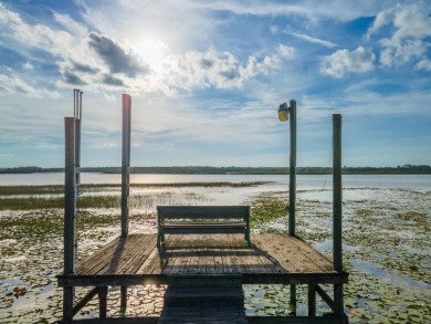 Situated on 2.19 acres with 200 feet of waterfront on Little - photo 45