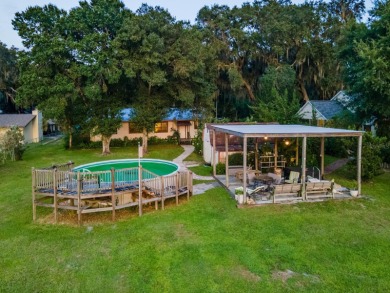 Situated on 2.19 acres with 200 feet of waterfront on Little - photo 46