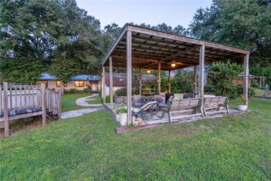 Situated on 2.19 acres with 200 feet of waterfront on Little - photo 47