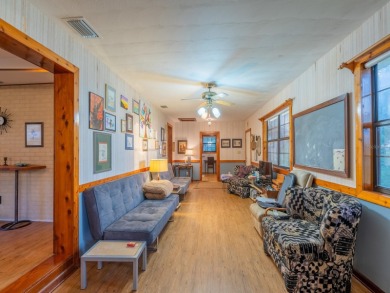Situated on 2.19 acres with 200 feet of waterfront on Little - photo 50