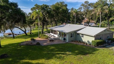 Nestled on 1.33 acres of picturesque lakefront property, this - photo 50