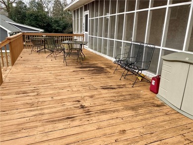 Enjoy the best of lake life in this charming 3-bedroom, 2-bath - photo 3