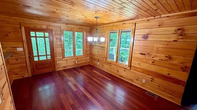 Welcome to 18 Crazy Horse Lane! This stunning lakefront log home - photo 4