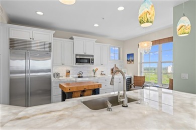 Enjoy the penthouse lifestyle in Grand Isle! The top floor - photo 4