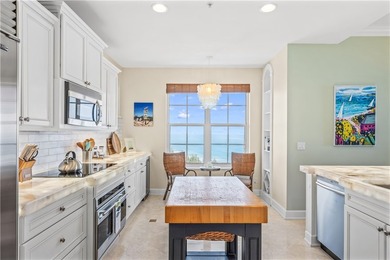 Enjoy the penthouse lifestyle in Grand Isle! The top floor - photo 8