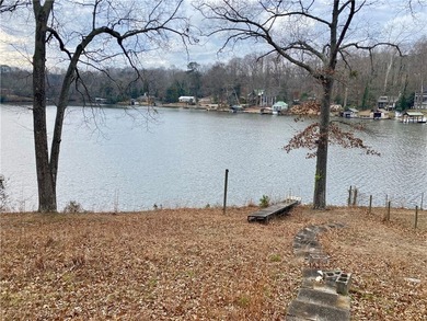 Enjoy the best of lake life in this charming 3-bedroom, 2-bath - photo 8