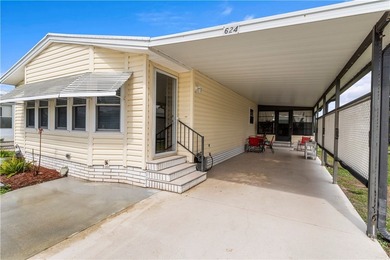 Immaculate Barefoot Bay home that shows pride of ownership! - photo 1