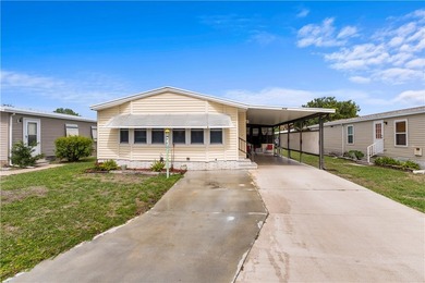 Immaculate Barefoot Bay home that shows pride of ownership! - photo 3