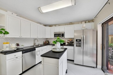 Impeccable 2-bedroom, 2.5-bath home located in a tranquil - photo 11