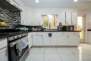 Welcome to this spacious and beautifully updated home nestled on - photo 9