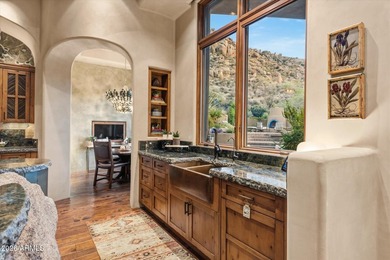 Set among Scottsdale's iconic granite boulder formations in the - photo 29