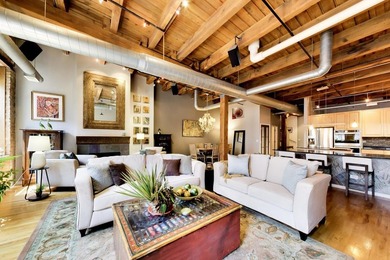 RARE PROPERTY ALERT: COVETED PENTHOUSE DUPLEX LOFT WITH PRIVATE - photo 2