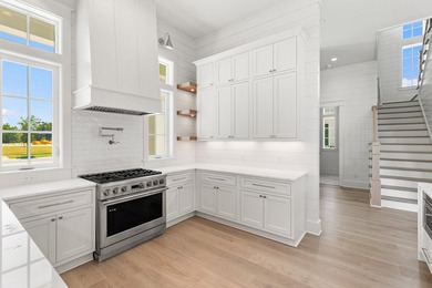 Crafted by Cole Construction, this newly envisioned retreat - photo 23