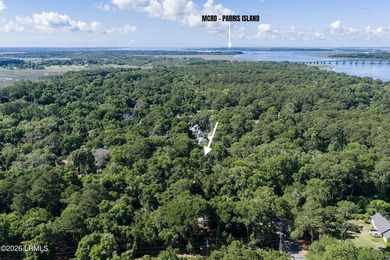Nestled beneath a canopy of majestic live oaks, this expansive 2 - photo 9