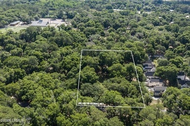Nestled beneath a canopy of majestic live oaks, this expansive 2 - photo 10