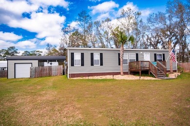 *NO FLOOD ZONE * Welcome to this turnkey coastal retreat nestled - photo 1