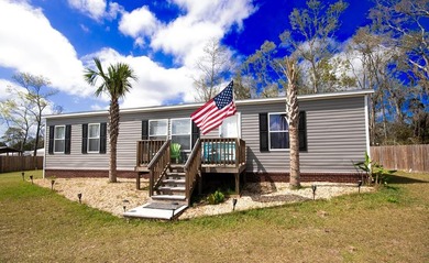 *NO FLOOD ZONE * Welcome to this turnkey coastal retreat nestled - photo 2