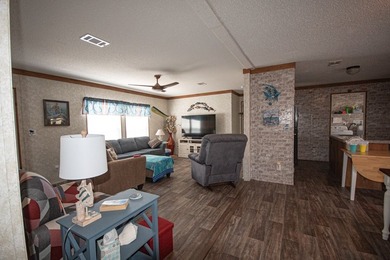 *NO FLOOD ZONE * Welcome to this turnkey coastal retreat nestled - photo 3