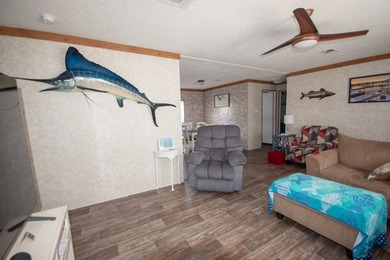 *NO FLOOD ZONE * Welcome to this turnkey coastal retreat nestled - photo 5