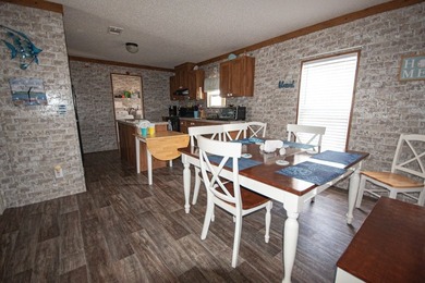 *NO FLOOD ZONE * Welcome to this turnkey coastal retreat nestled - photo 6