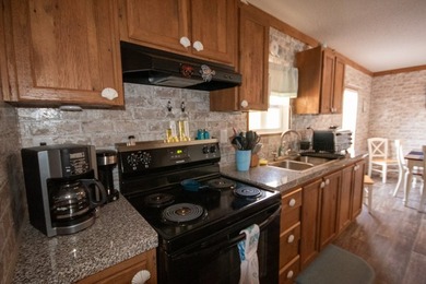 *NO FLOOD ZONE * Welcome to this turnkey coastal retreat nestled - photo 8