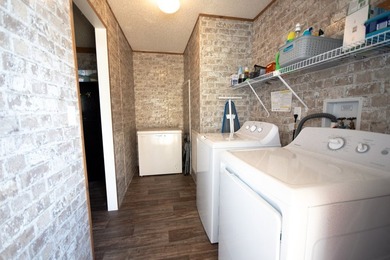 *NO FLOOD ZONE * Welcome to this turnkey coastal retreat nestled - photo 9